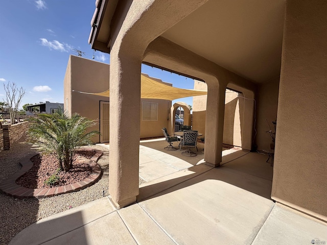 view of patio featuring outdoor dining space