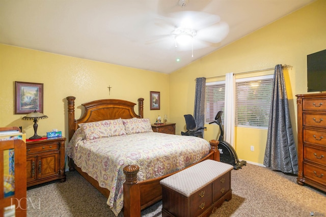 bedroom with ceiling fan, carpet floors, and lofted ceiling