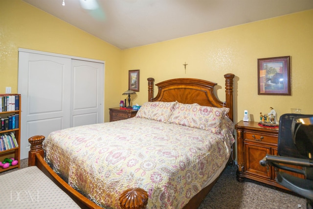 carpeted bedroom featuring ceiling fan, lofted ceiling, and a closet