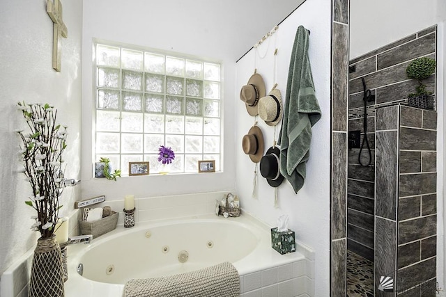 bathroom with shower with separate bathtub