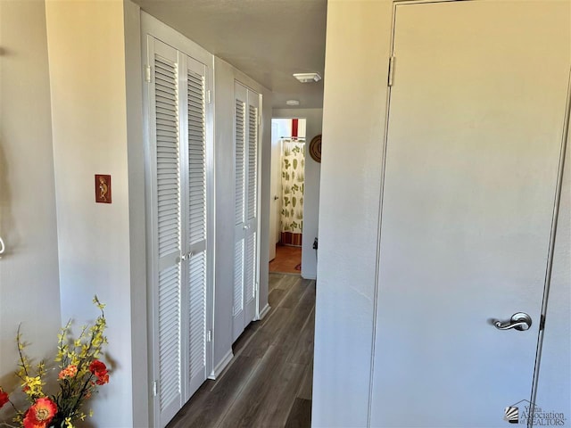 hall with dark wood finished floors