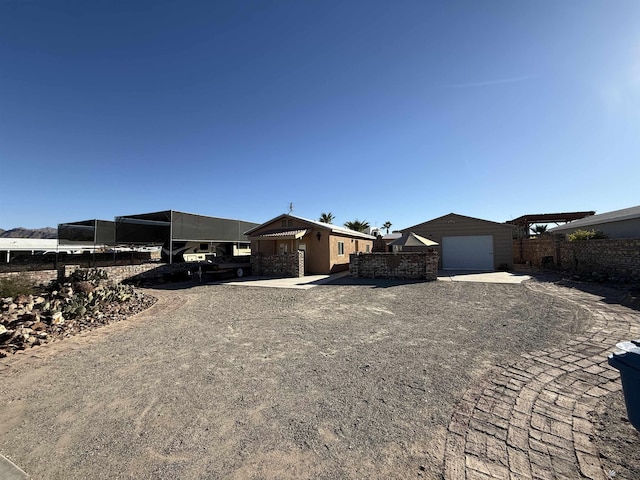 exterior space featuring a carport and a garage