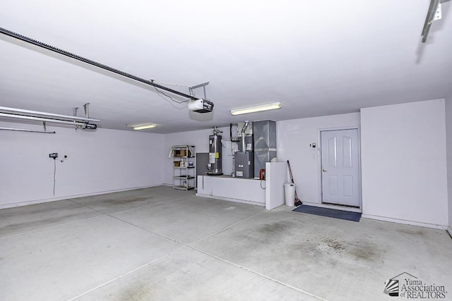 garage featuring heating unit, a garage door opener, and water heater