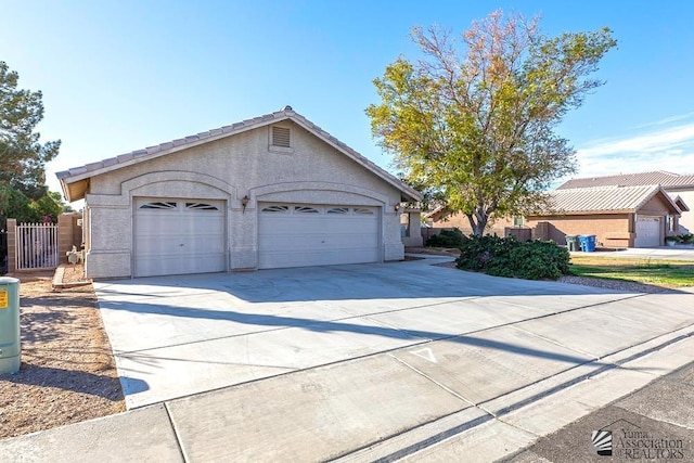 ranch-style home with a garage