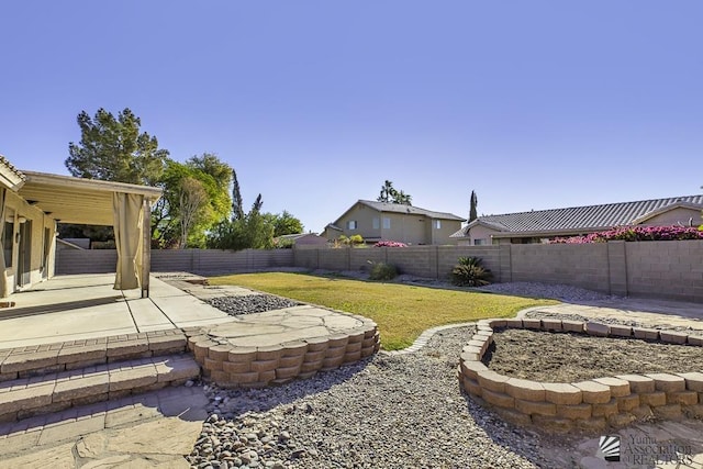 view of yard with a patio area