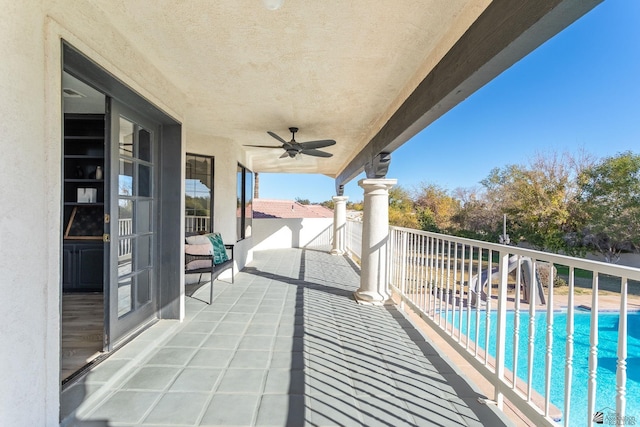 balcony featuring ceiling fan