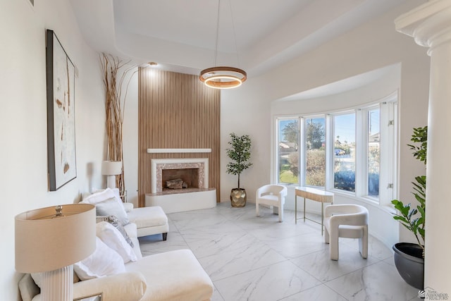 living room featuring a fireplace