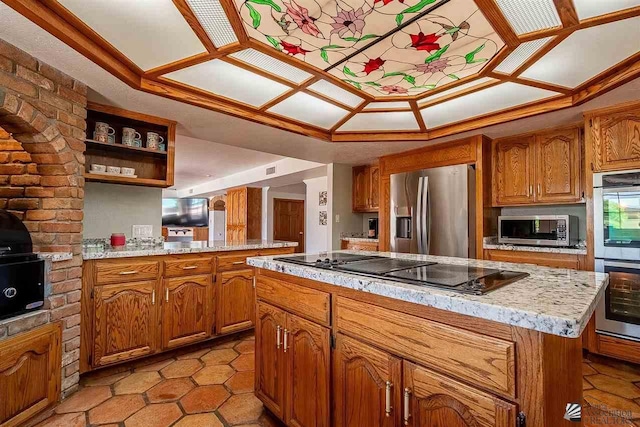 kitchen with stainless steel appliances and a center island