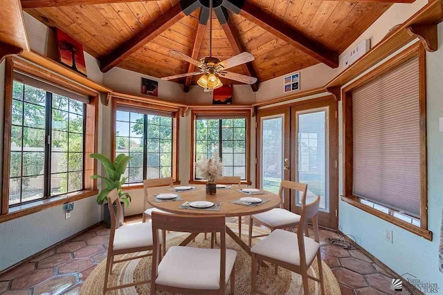 sunroom / solarium with vaulted ceiling with beams, wood ceiling, french doors, and ceiling fan