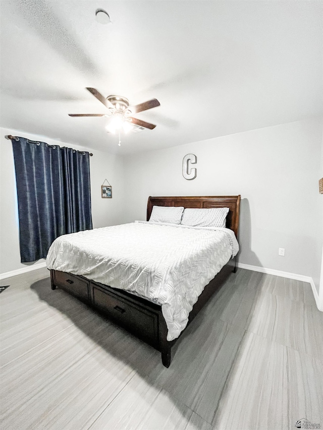 bedroom featuring ceiling fan