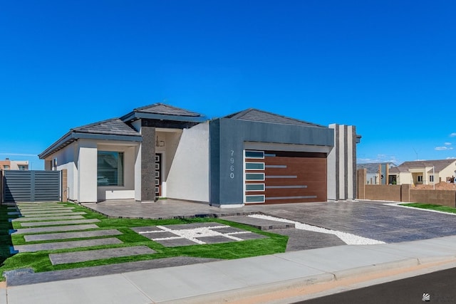 view of front of house with a garage