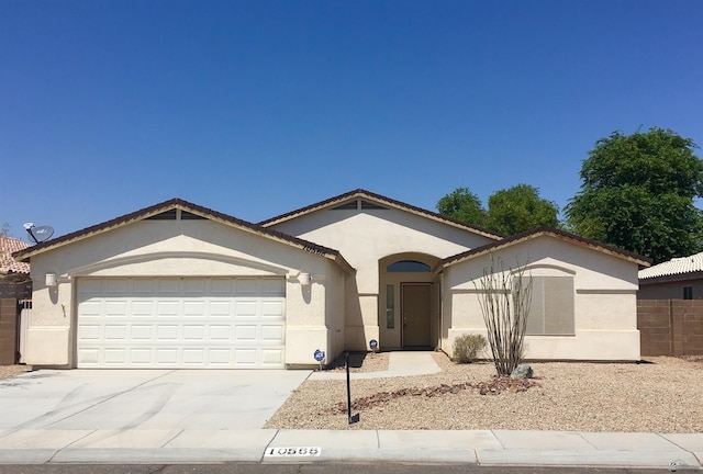 ranch-style house featuring a garage