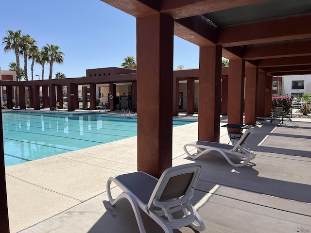 community pool with a patio