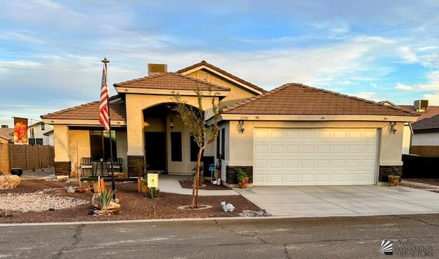 view of front of home featuring a garage