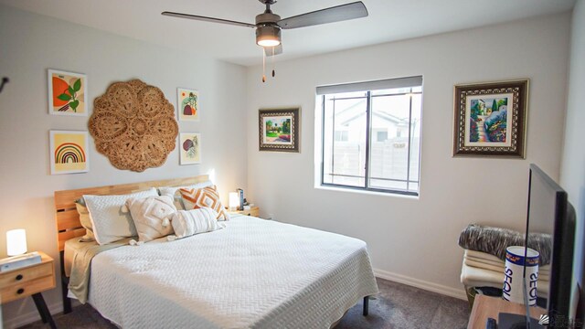 carpeted bedroom featuring ceiling fan