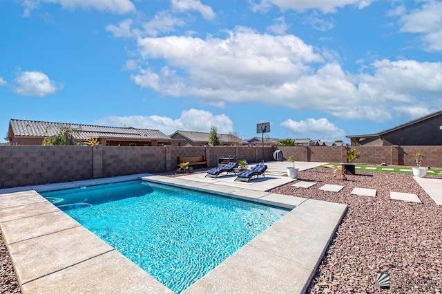 view of pool featuring a patio area