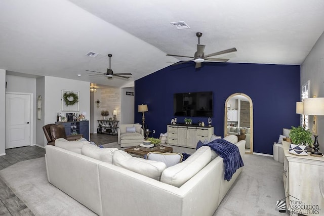 living room with lofted ceiling and ceiling fan