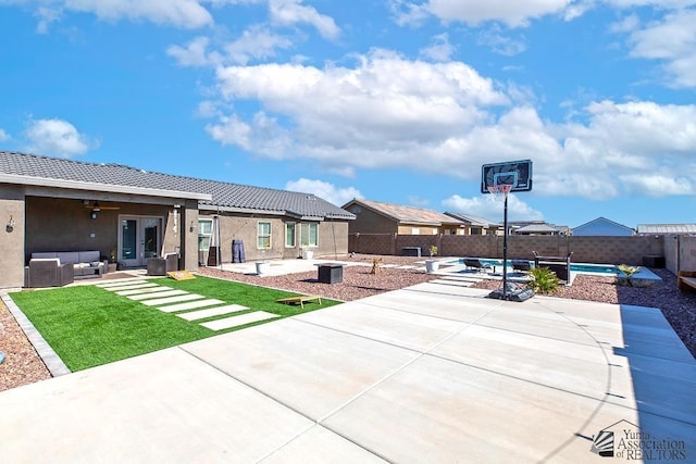 view of patio featuring a fenced in pool and an outdoor hangout area