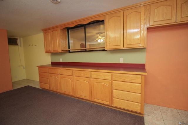 kitchen with light carpet