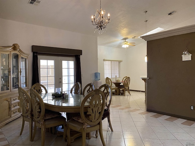 dining space with french doors, visible vents, and light tile patterned flooring