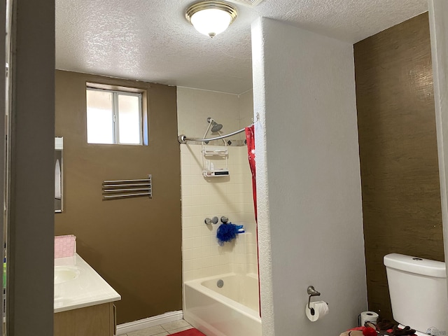 bathroom with tub / shower combination, vanity, toilet, and a textured ceiling