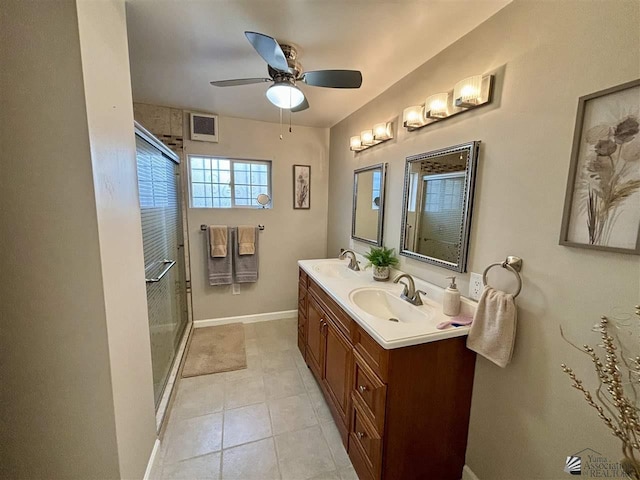 bathroom featuring ceiling fan, tile patterned flooring, vanity, and an enclosed shower