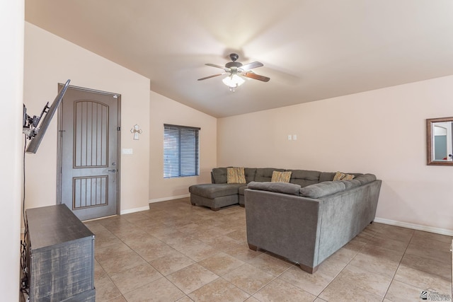 living room featuring ceiling fan, lofted ceiling, and light tile patterned floors