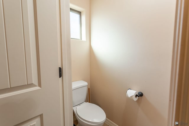 bathroom featuring toilet