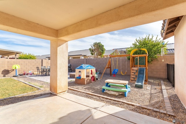 view of patio featuring a playground