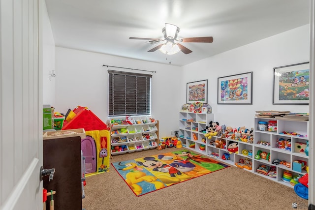 recreation room featuring carpet flooring and ceiling fan