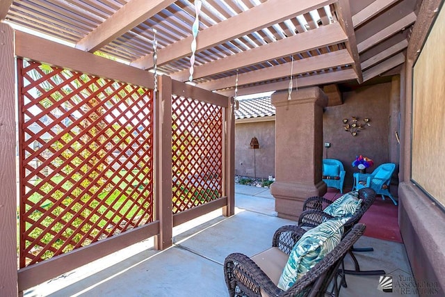 view of patio featuring a pergola