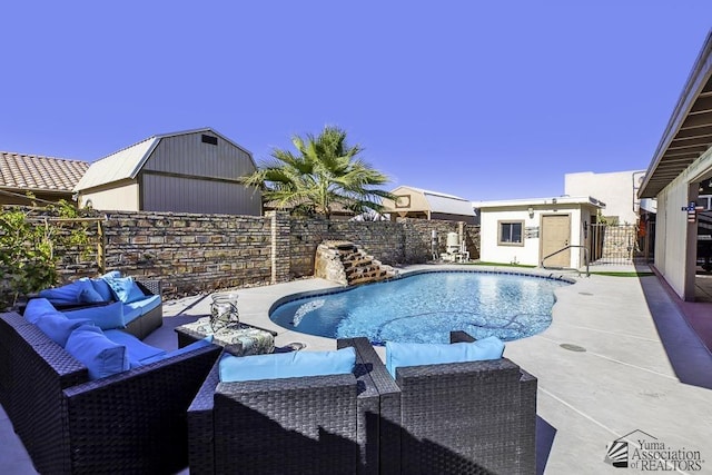 view of swimming pool with an outdoor living space, an outdoor structure, and a patio