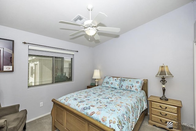 bedroom with light carpet and ceiling fan