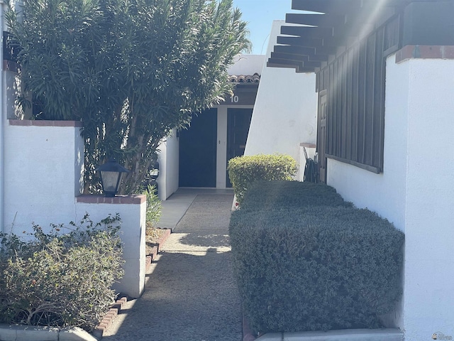 view of home's exterior with stucco siding