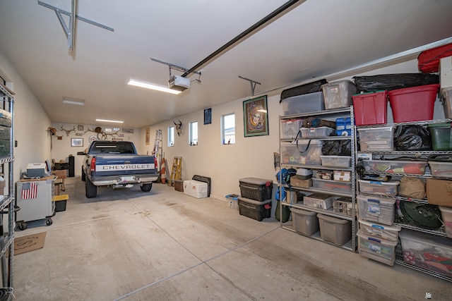 garage featuring a garage door opener