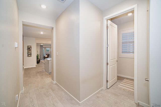 hall featuring light hardwood / wood-style flooring