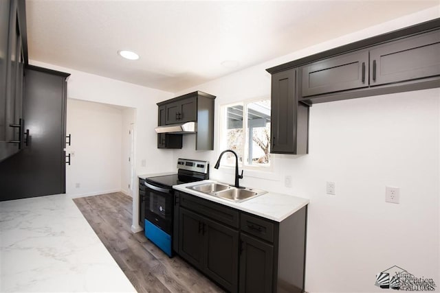 kitchen with sink and electric range