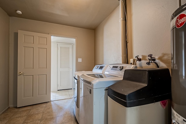 clothes washing area featuring washer and clothes dryer