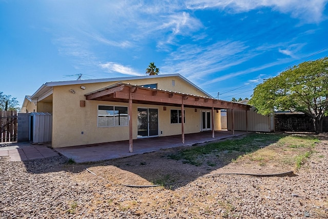 rear view of house with a patio area