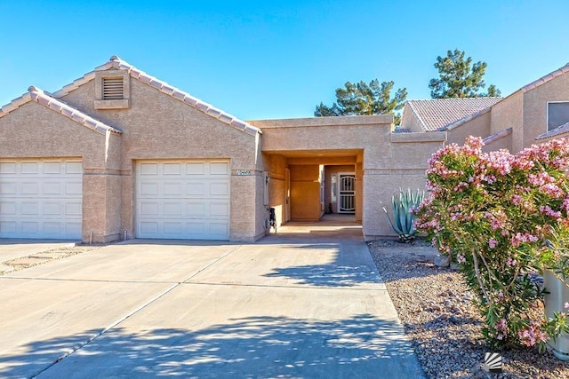 view of front of property featuring a garage