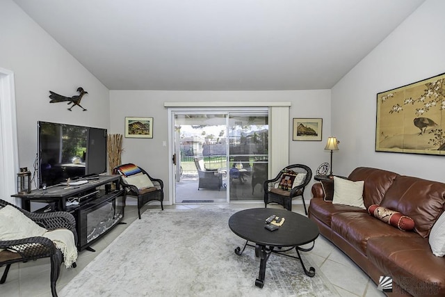 tiled living room with lofted ceiling