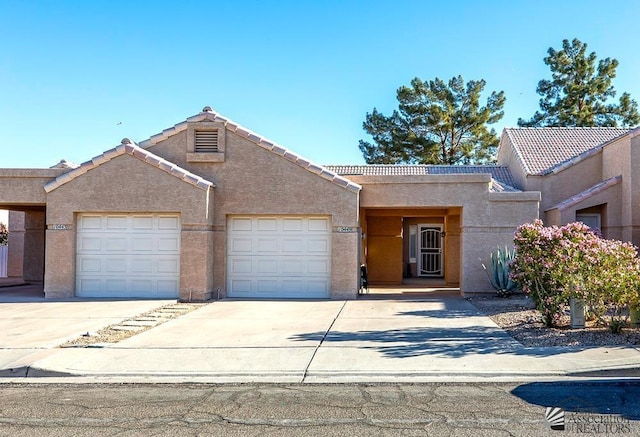 view of front of home with a garage