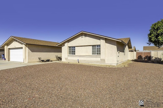 ranch-style home with a garage