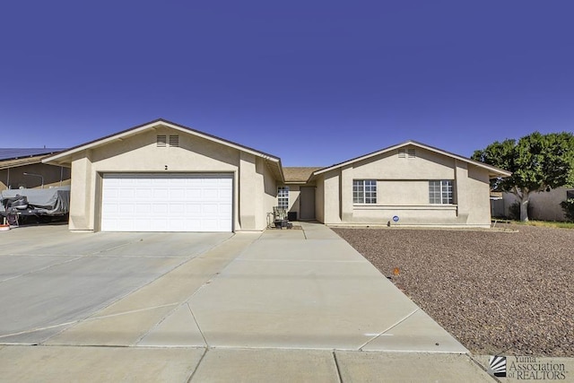 ranch-style house with a garage