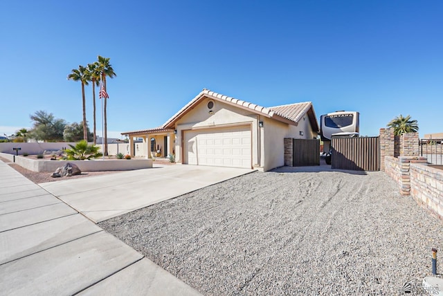 single story home with a garage