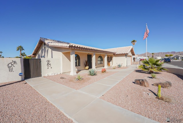 view of front of property with a garage