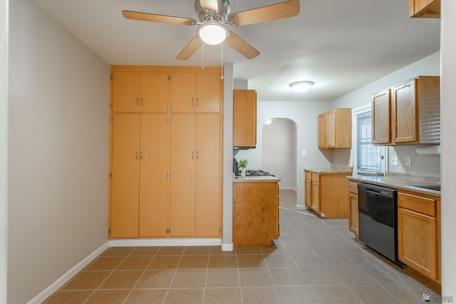 kitchen featuring black dishwasher, ceiling fan, and light tile patterned flooring