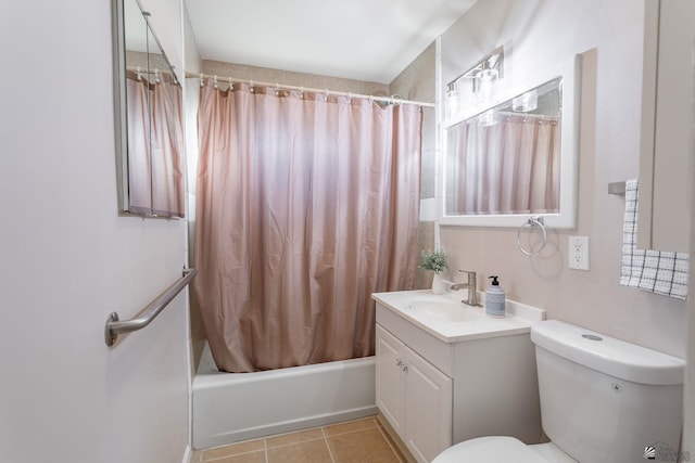 full bathroom with tile patterned flooring, shower / bath combo, vanity, and toilet