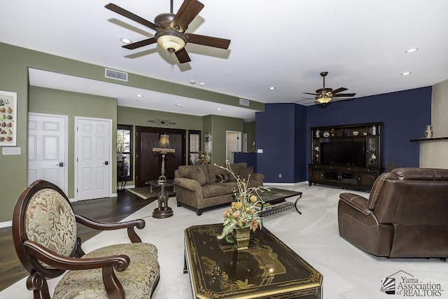 living room with ceiling fan