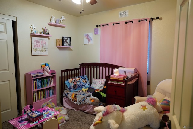 bedroom featuring carpet flooring and visible vents